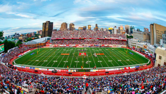 Large stadium filled with fans; McGill University