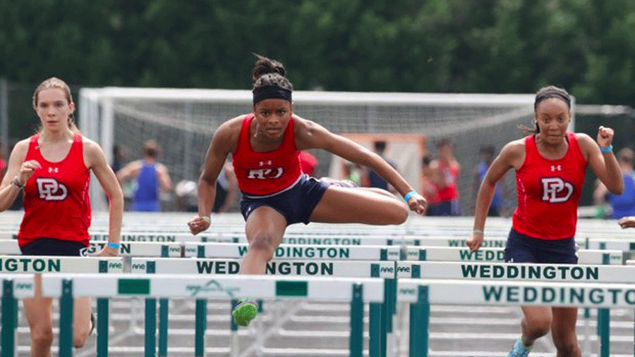 Falon Spearman during a hurdles event