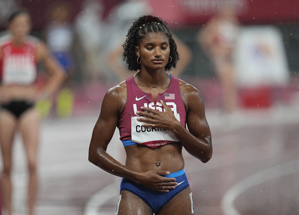 Anna Cockrell practicing mindfulness at the start of a track race