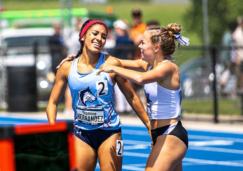 Yasmine Hernandez congratulated by team mate after claiming the National Track & Field Championship at 1500 meters in 2022
