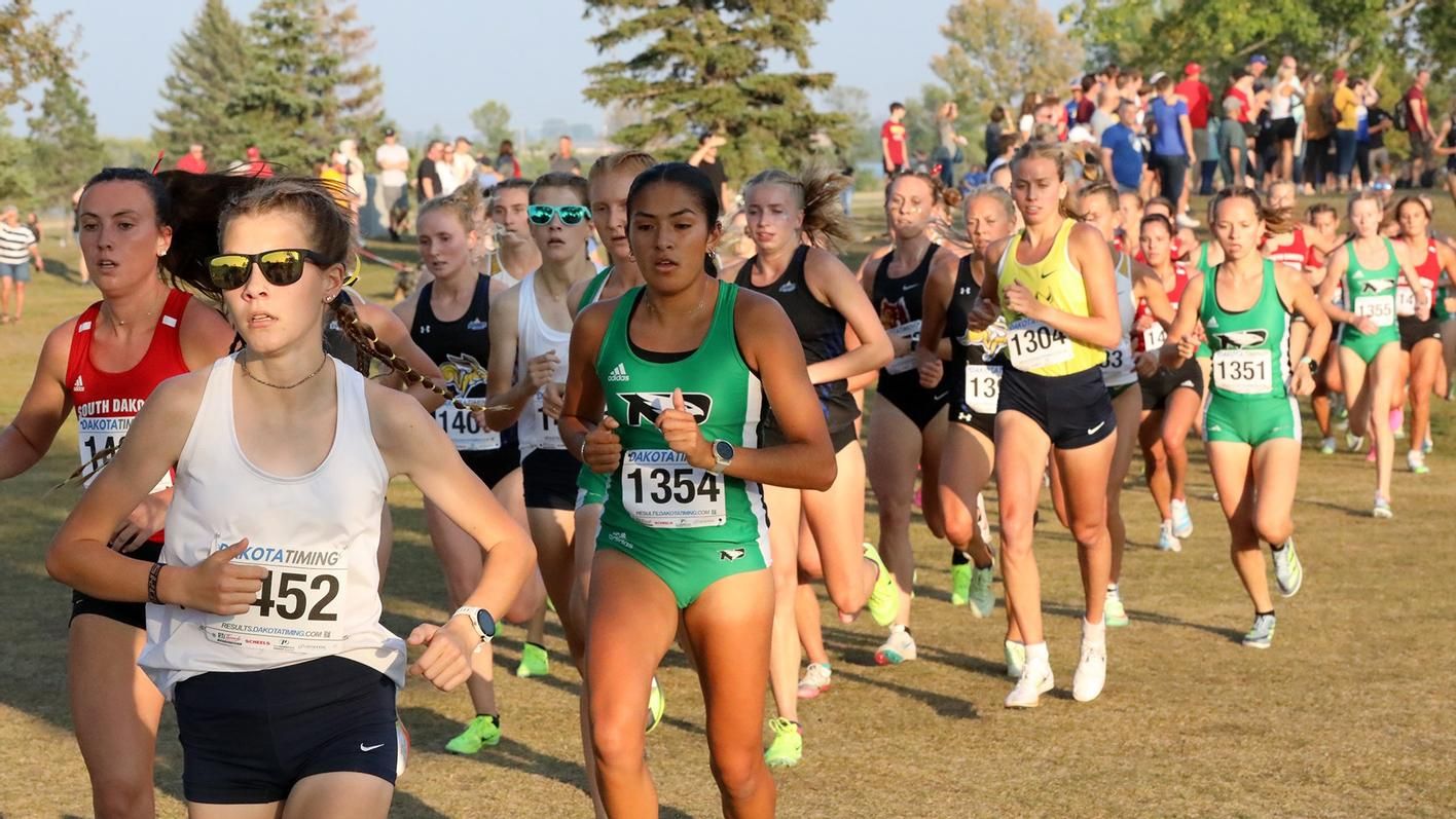 University of North Dakota Fighting Hawks women's cross country team competing at the Paul Short Run